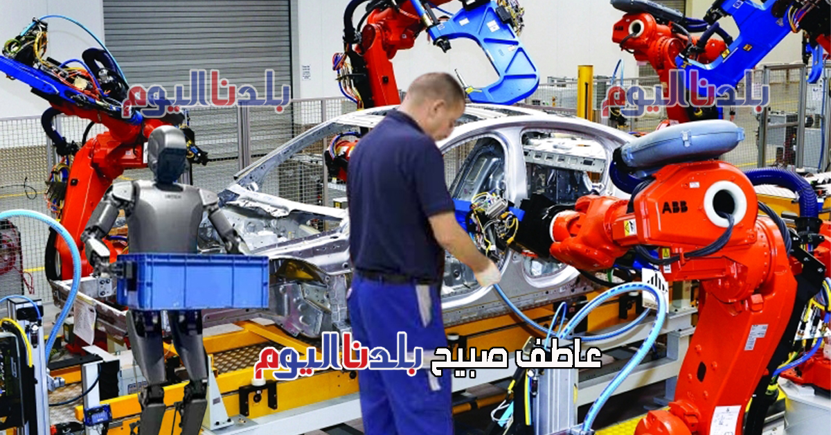 روبوتات وبشر يتعاونون في صناعة السيارات