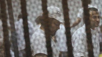 المؤبد لمستشار المعزول و 13 آخرين في قضية «اللجان النوعية»