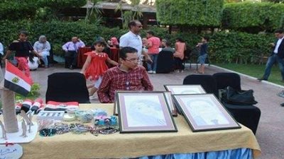 بالصور.. تنظيم سوق فنى لذوي القدرات الخاصة ببرج القاهرة