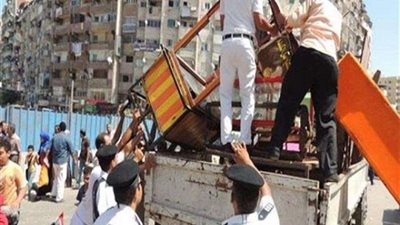 شاهد.. شرطة مرافق الجيزة خلال إزالة التعديات والإشغالات