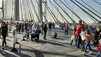 بالصور.. المواطنون يحتفلون في ثاني أيام العيد على محور روض الفرج