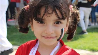 صور الأطفال تزين أرجاء ستاد القاهرة في افتتاحية 