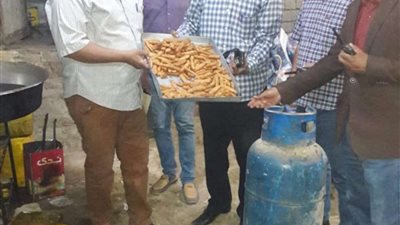 التموين: ضبط مصنع مواد غذائية غير صالحة بكرداسة