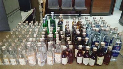 حبس صاحب محل ضبط بحوزته 120 زجاجة خمرة بالمرج