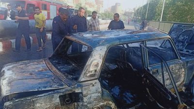 تفحم سيارة أعلى كوبرى فيصل بأسيوط