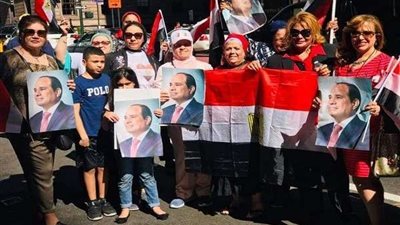 بالأعلام.. الجالية المصرية في أمريكا تحتفل بالرئيس السيسي (صور)