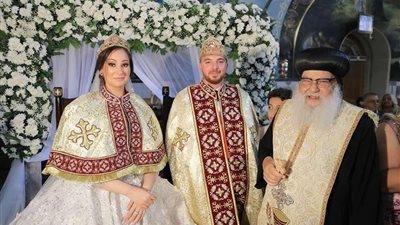 بالصور.. زفاف نجل كاهن قرية 