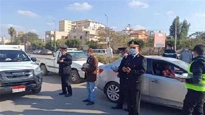 شرطة قنا تشارك فى مكافحة فيروس كورونا بهذا التصرف
