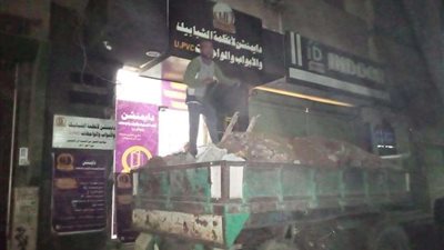 تحرير محضر لتعديل بناء بمحل تجاري مخالف بحي شرق سوهاج