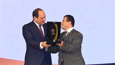 أول معيد مصاب بمتلازمة داون 