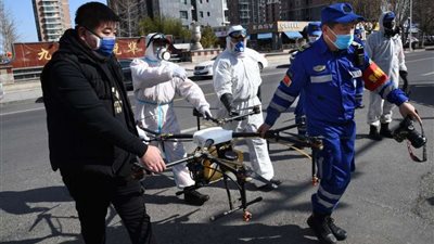 الصين تلجأ للطائرات المسيرة والروبوتات لمواجهة فيروس 