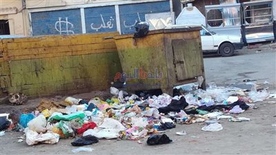 القمامة تحاصر شارع الأتوبيس ومدرسة 