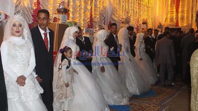 صور.. حفل زفاف جماعي بالجيزة
