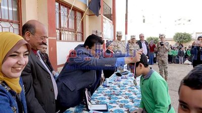 تكريم نجلي الشهيد أحمد عبده في احتفالية ببني سويف