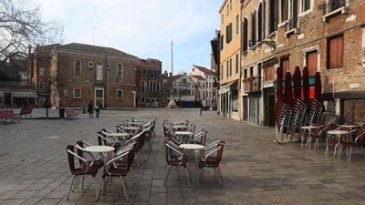 إيطاليا تغلق كل متاجرها.. وتجبر زوار المقاهي على الابتعاد عن بعضهم
