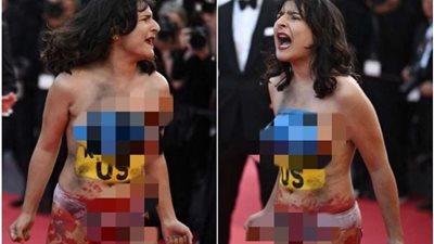 ظهور امرأة عارية على السجادة الحمراء بمهرجان كان السينمائي