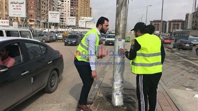 مستقبل وطن بمدينة نصر يعزل أعمدة الإنارة لحماية المواطنين من الكهرباء