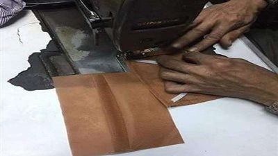 حبس ترزي لتصنيعه 11 ألف كمامة في باب الشعرية من خامات مجهولة المصدر