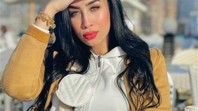 كاميرات المراقبة تلتقط لحظة ضرب آمال أبوالمجد على يد زوجها فى الشارع