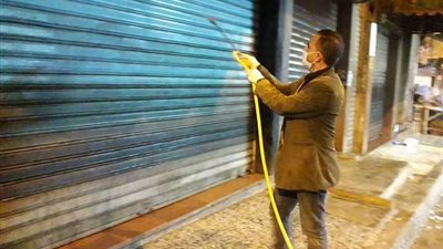 رش وتطهير منشآت حكومية وخدمية بمركز ملوي بالمنيا وتحرير 14 مخالفة تموينية