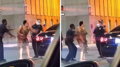 أمراة وشرطي يتبادلان الكمات بولاية ميريلاند الامريكية