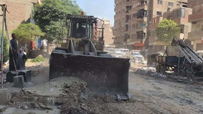 إزالة تعديات وبروز المحال والأكشاك المخالفة بالجيزة