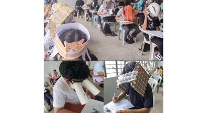 خوذات وقبعات وعلب بيض لمنع الغش في الامتحانات الجامعية بالفلبين