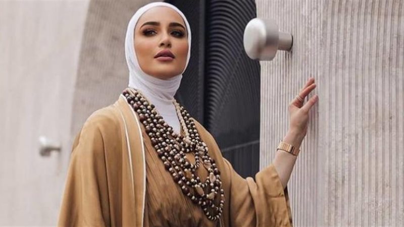 تنسيقات المعطف الطويل