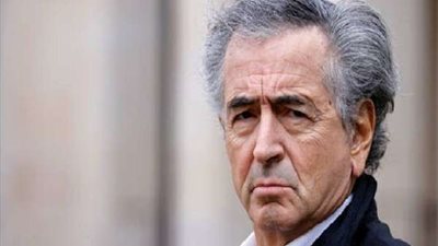 مسلحون يطردون برنارد ليفي عرّاب 