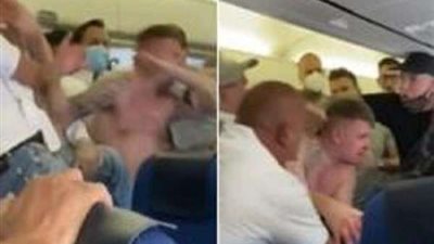 شاهد.. معركة بين ركاب طائرة بسبب الكمامات