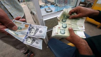 عراك أمام محلات الصرافة بسبب الريال الإيراني