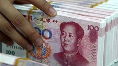 اليوان الصيني يستعد لإزاحة الدولار كعملة احتياطية عالمية