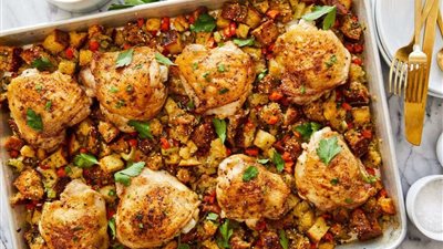 طريقة إعداد أفخاذ دجاج شهية بالخضروات والتوست فى الفرن