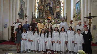 الكاثوليك تحتفل بالمناولة الأولى لأبناء كنيسة سان جورج بالإسكندرية