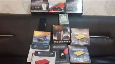 أمن الجيزة يداهم محلًا لبيع أجهزة 