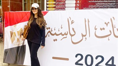 هشام حنفي وزوجته يدليان بصوتهما فى انتخابات الرئاسة 2024