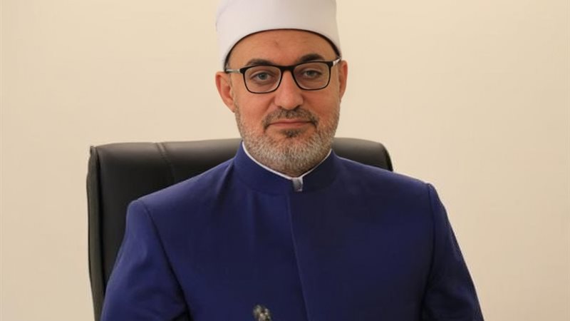 الدكتور نظير عياد،