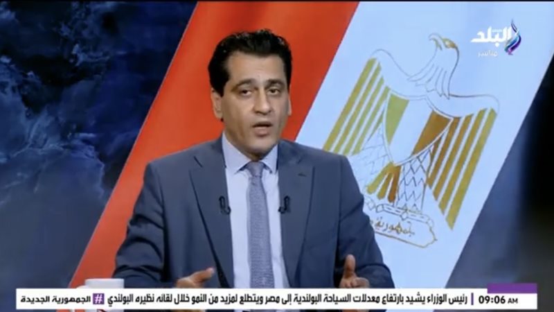 الكاتب الصحفي أيمن