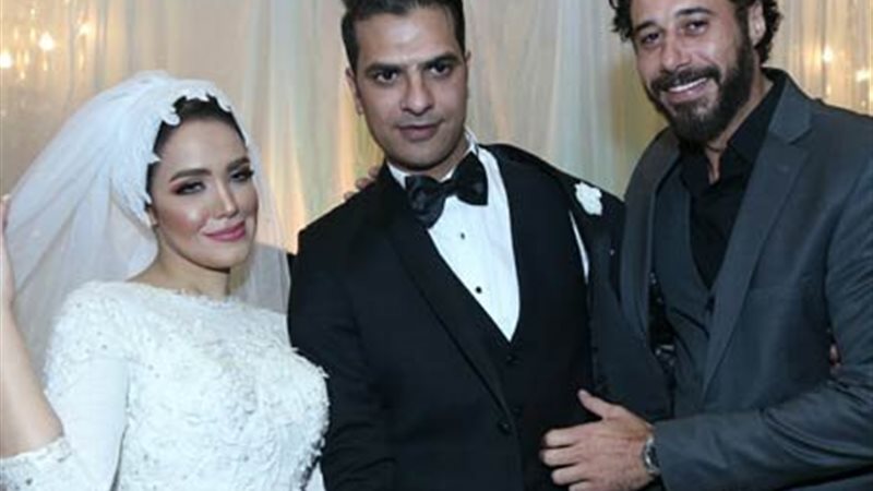 مصطفى أبو سريع وزوجته