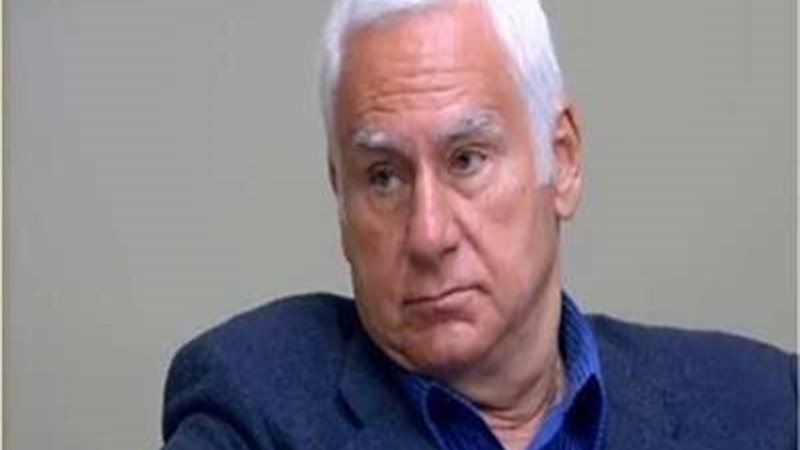 الكاتب الصحفي شريف